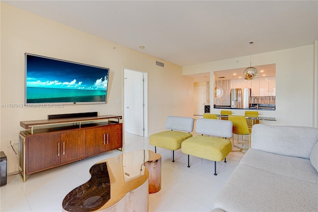 1250 S Miami Ave Unit 1109, Miami, FL 33130 - living area featuring light tile patterned floors and visible vents