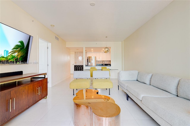1250 S Miami Ave Unit 1109, Miami, FL 33130 - living room featuring light tile patterned floors, baseboards, and visible vents
