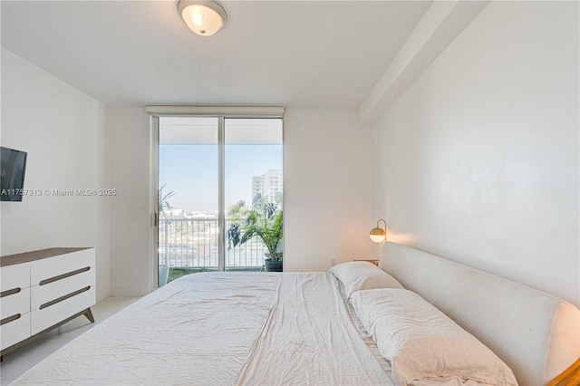 1250 S Miami Ave Unit 1109, Miami, FL 33130 - bedroom with access to outside and a wall of windows