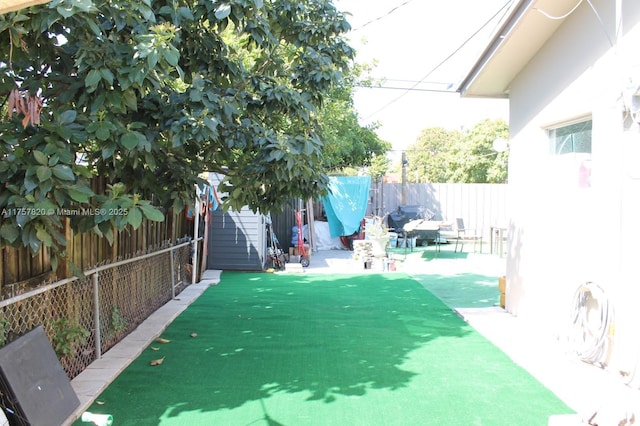 exterior space with a fenced backyard and a patio