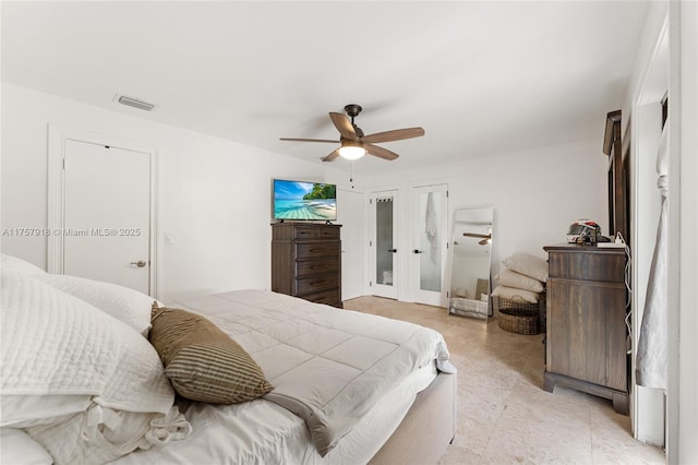 bedroom featuring visible vents and a ceiling fan