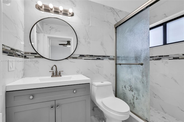 full bath featuring tasteful backsplash, vanity, toilet, and walk in shower