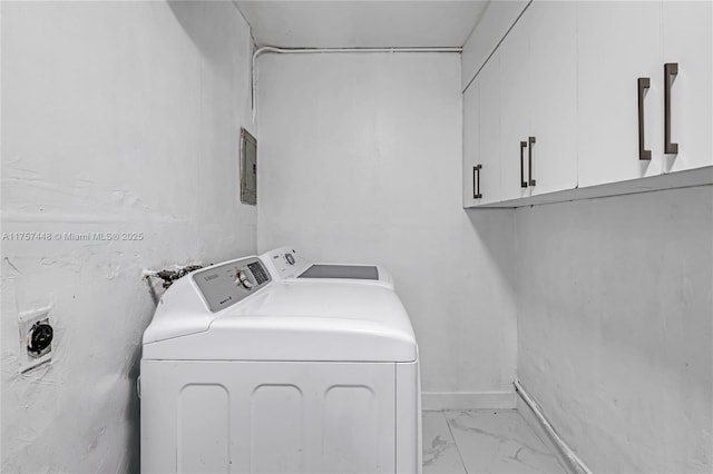 laundry room featuring marble finish floor, electric panel, cabinet space, and washer and dryer