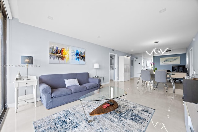 living room featuring baseboards