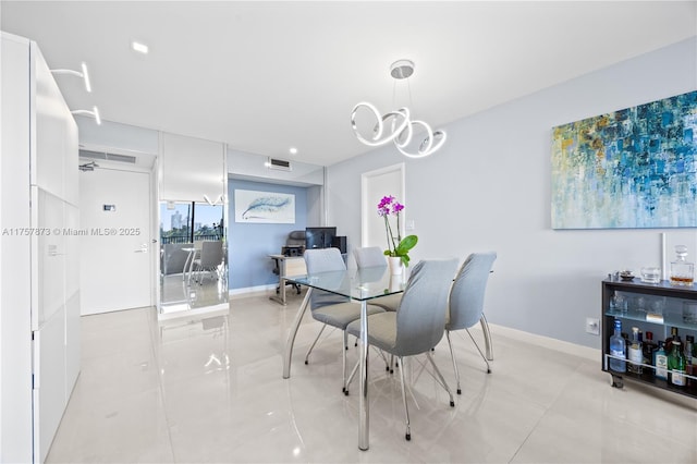 dining space featuring light tile patterned floors, baseboards, and visible vents