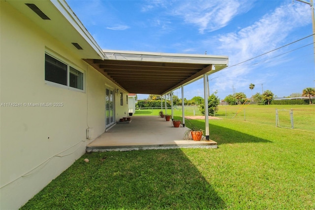 exterior space featuring fence