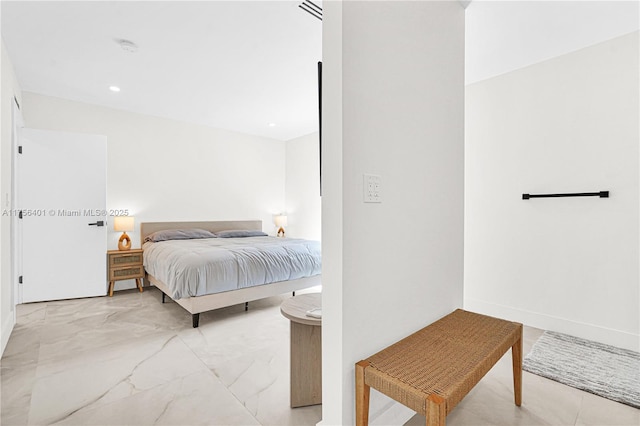 bedroom with baseboards and recessed lighting