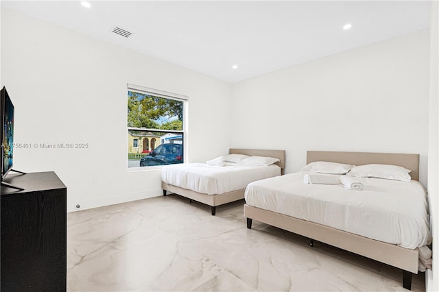 bedroom with recessed lighting, marble finish floor, visible vents, and baseboards