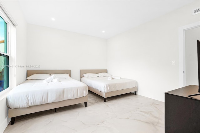 bedroom featuring marble finish floor, visible vents, and recessed lighting