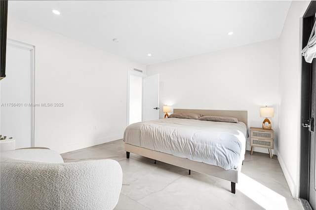 bedroom featuring recessed lighting, visible vents, finished concrete flooring, and baseboards