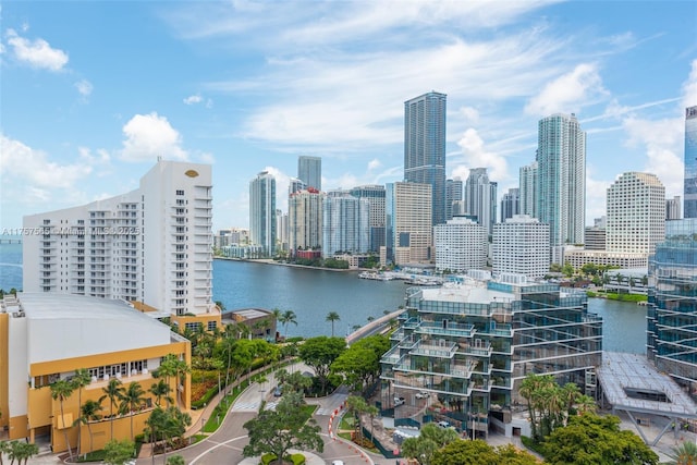 property's view of city featuring a water view