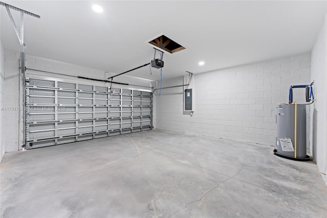 garage featuring water heater, concrete block wall, electric panel, and a garage door opener