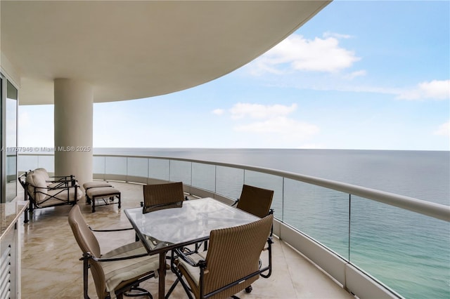 balcony featuring a water view