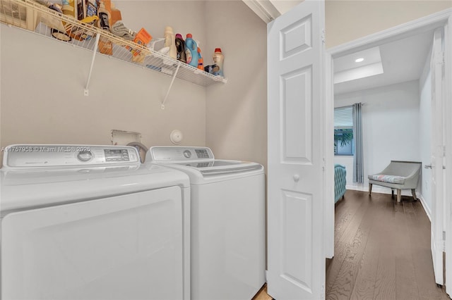 laundry room with laundry area, baseboards, wood finished floors, washer and dryer, and recessed lighting