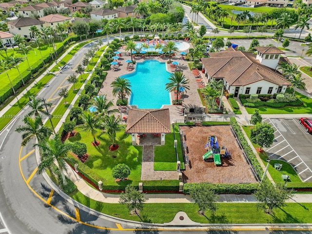 birds eye view of property with a residential view