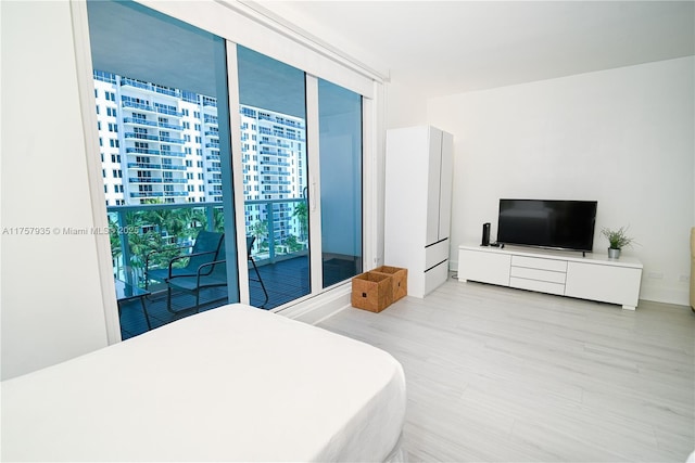 bedroom with light wood-style floors