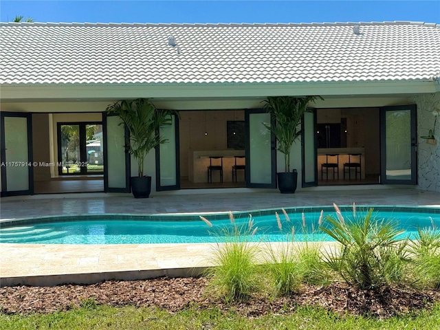 pool with a patio