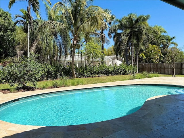 view of pool with fence and a fenced in pool