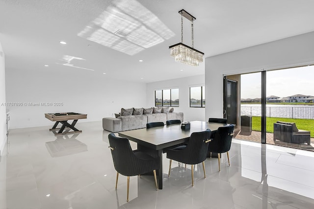 dining space with plenty of natural light, visible vents, and recessed lighting