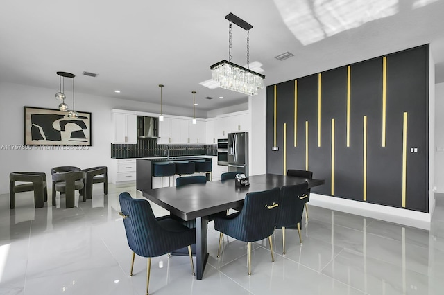 dining room with visible vents and recessed lighting