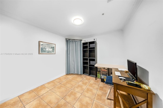 office featuring light tile patterned floors, baseboards, and crown molding