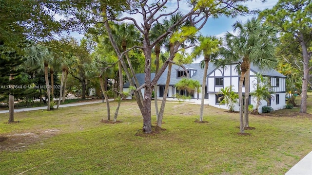 exterior space featuring a front yard