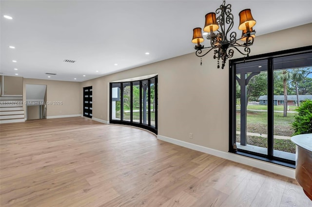 interior space featuring visible vents, light wood-style flooring, and recessed lighting