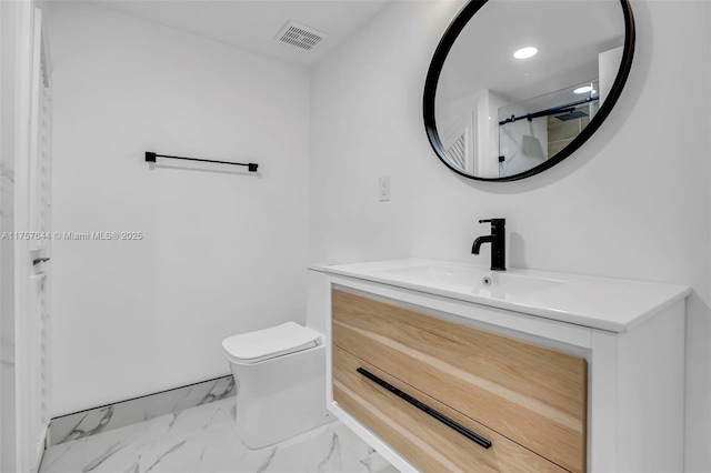 full bathroom featuring visible vents, toilet, a shower with shower door, marble finish floor, and vanity