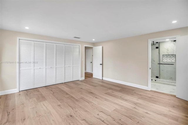 unfurnished bedroom featuring baseboards, visible vents, wood finished floors, a closet, and recessed lighting