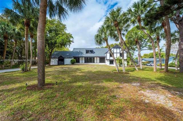 view of front of house with a front lawn