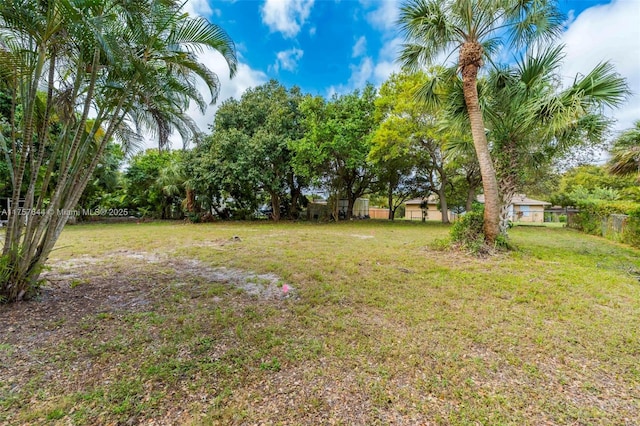 view of yard with fence