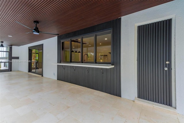 view of patio / terrace with a ceiling fan