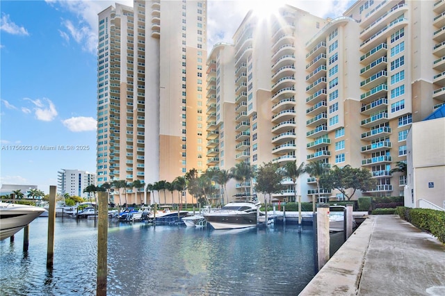 exterior space featuring a boat dock and a water view