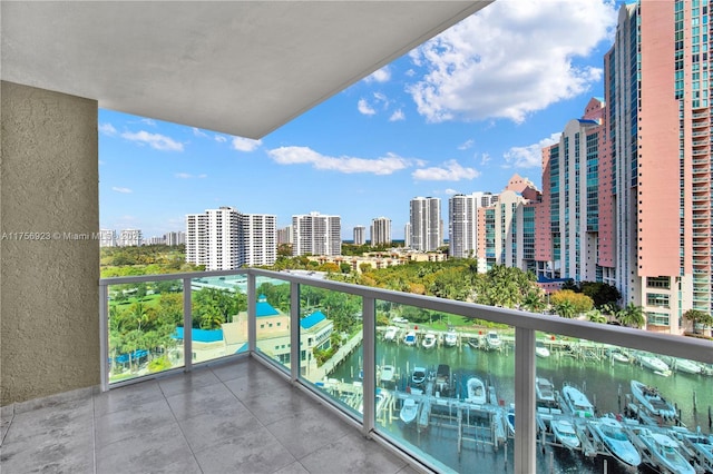 balcony with a city view and a water view