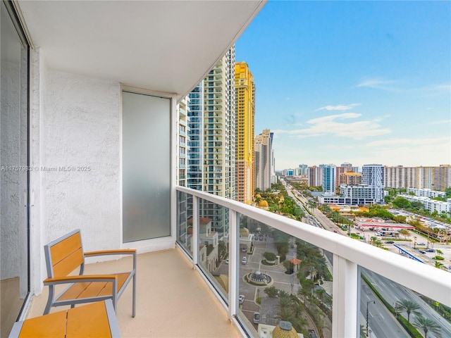 balcony featuring a city view