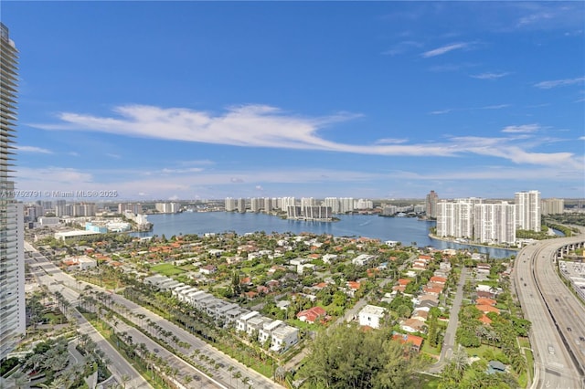 bird's eye view with a view of city and a water view