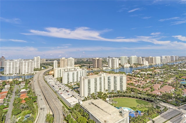 bird's eye view featuring a view of city and a water view