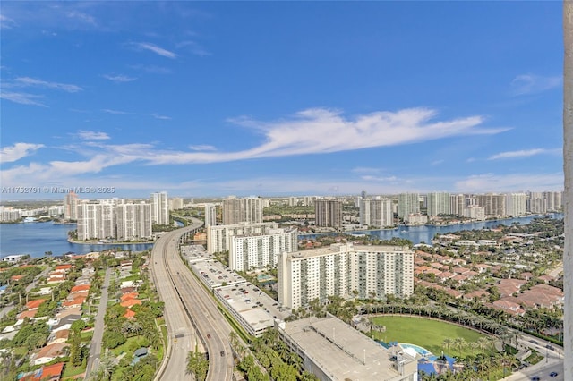 bird's eye view featuring a water view and a view of city