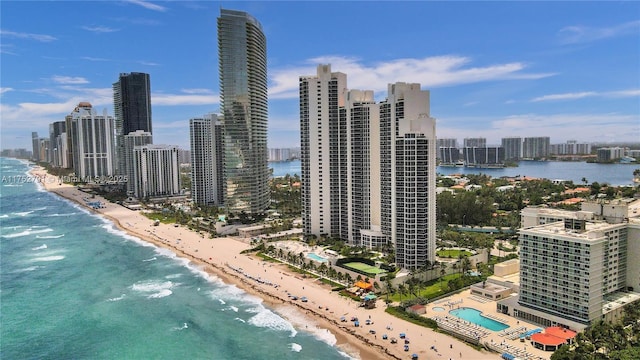 city view featuring a water view and a beach view