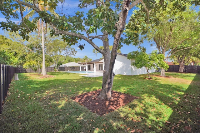 view of yard featuring a fenced backyard and a fenced in pool