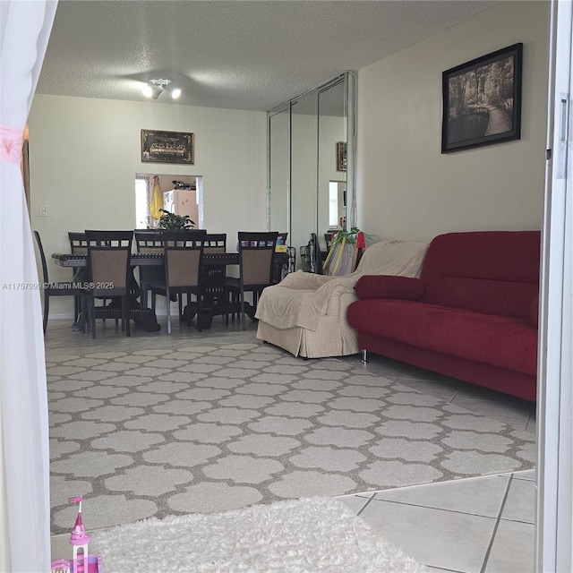 living room with a textured ceiling