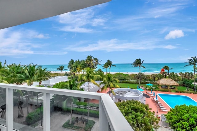 balcony featuring a water view