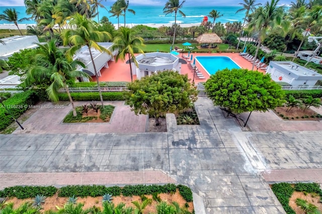 view of swimming pool with a water view