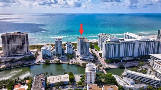 drone / aerial view with a water view and a city view