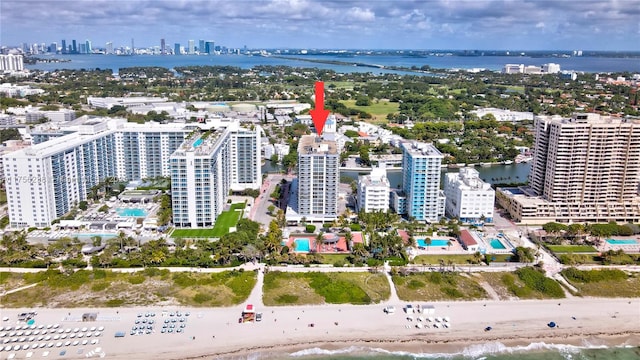 drone / aerial view with a water view and a view of city