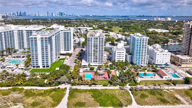 aerial view featuring a view of city and a water view