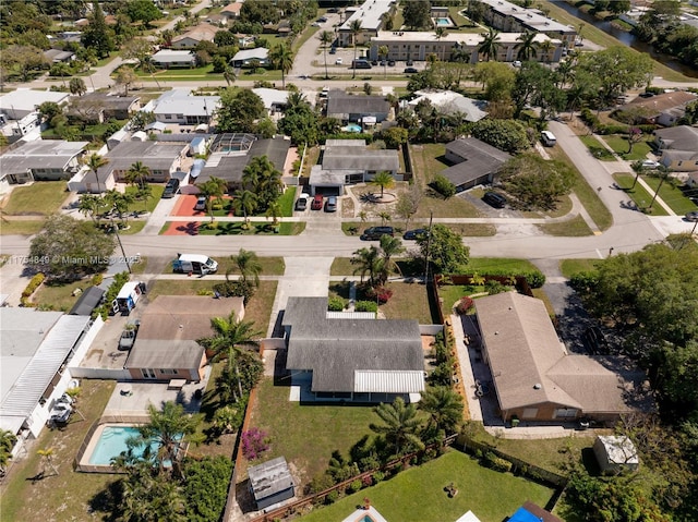 birds eye view of property with a residential view