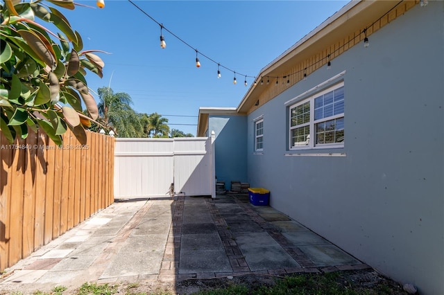 view of patio / terrace featuring fence