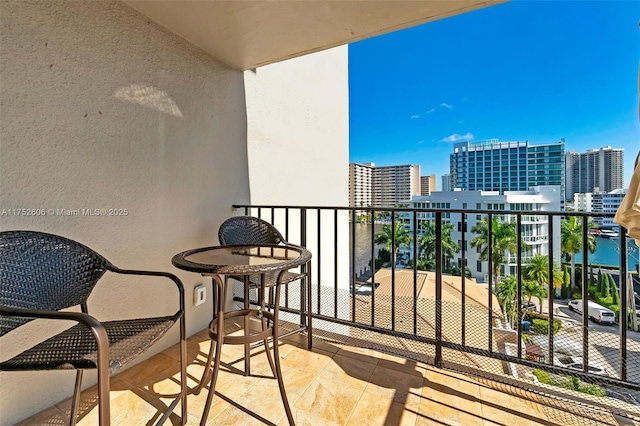 balcony featuring a city view