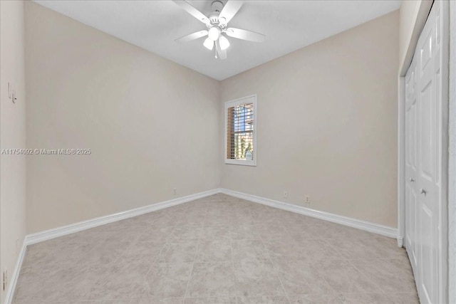 unfurnished bedroom featuring a ceiling fan, a closet, and baseboards